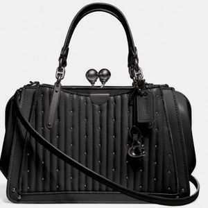 Beautiful kisslock leather coach